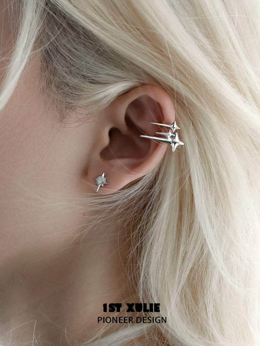 1STXULIE galactic star geometric earrings in silver, showcasing unique star designs for a modern look
