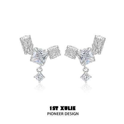Geometric silver earrings featuring unique shapes and sparkling accents for a modern look