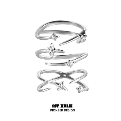 Geometric silver ring set featuring unique designs and sparkling accents by 1STXULIE