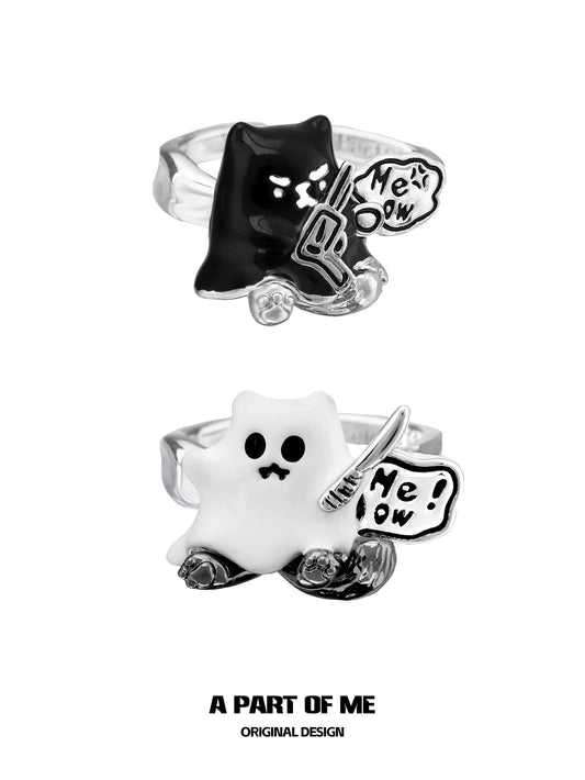 A PART OF ME ghost kitten ring featuring a black and white design with playful details