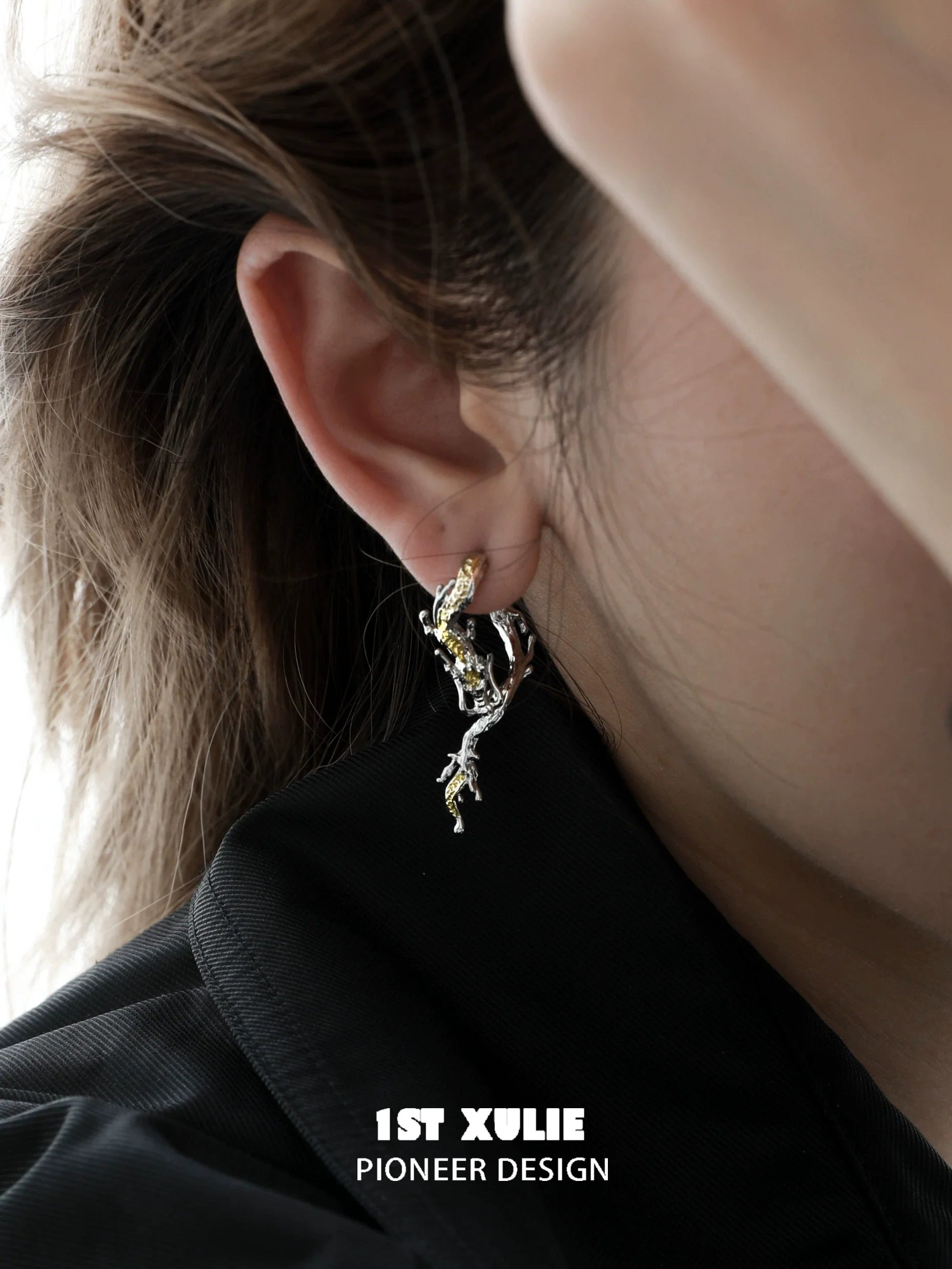 Stylish gold dragon stud earrings designed by 1ST XULIE, featuring intricate detailing for a unique look