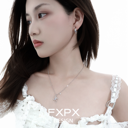 FXPX cute purple bear ear clips from Gothhalo Jewelry worn with a chic outfit