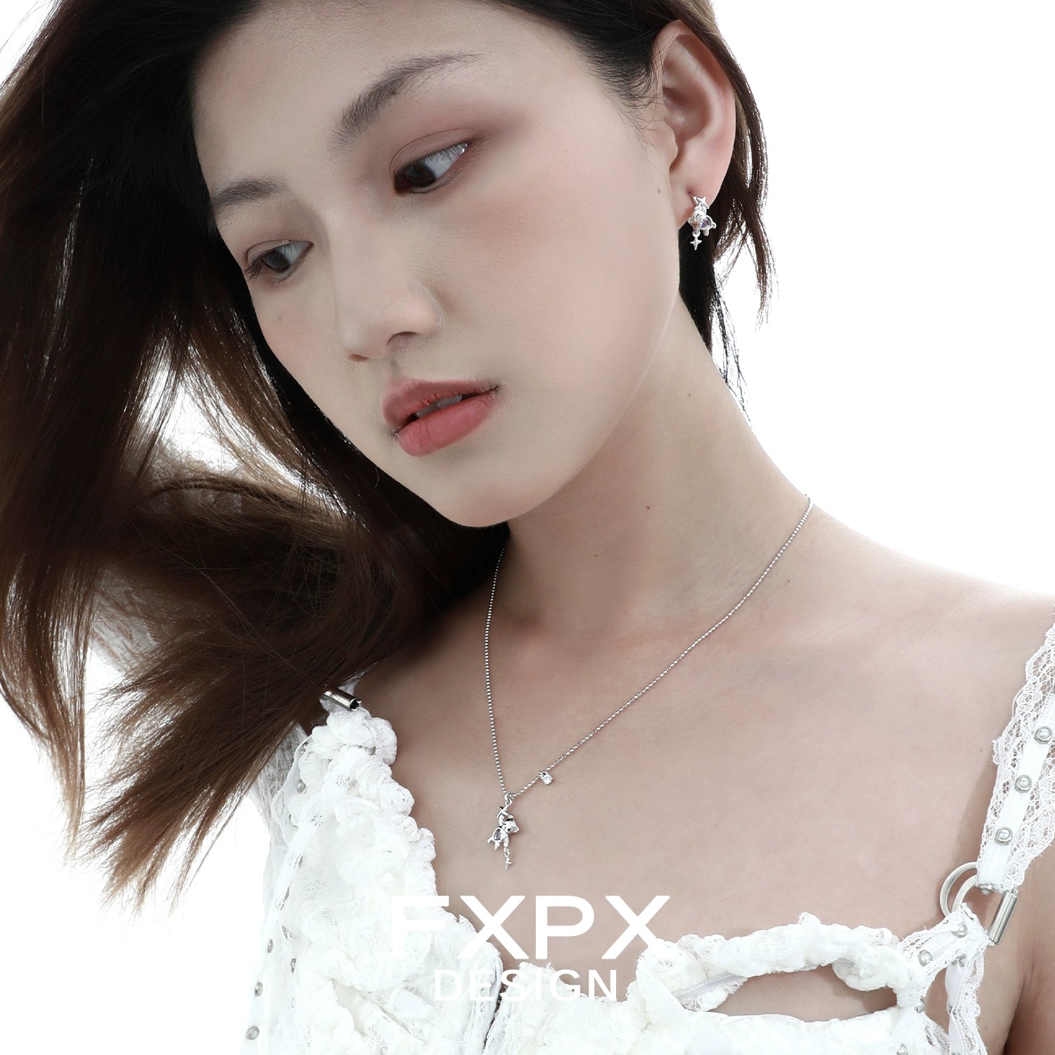 FXPX cute purple bear ear clips from Gothhalo Jewelry worn by a model with flowing hair