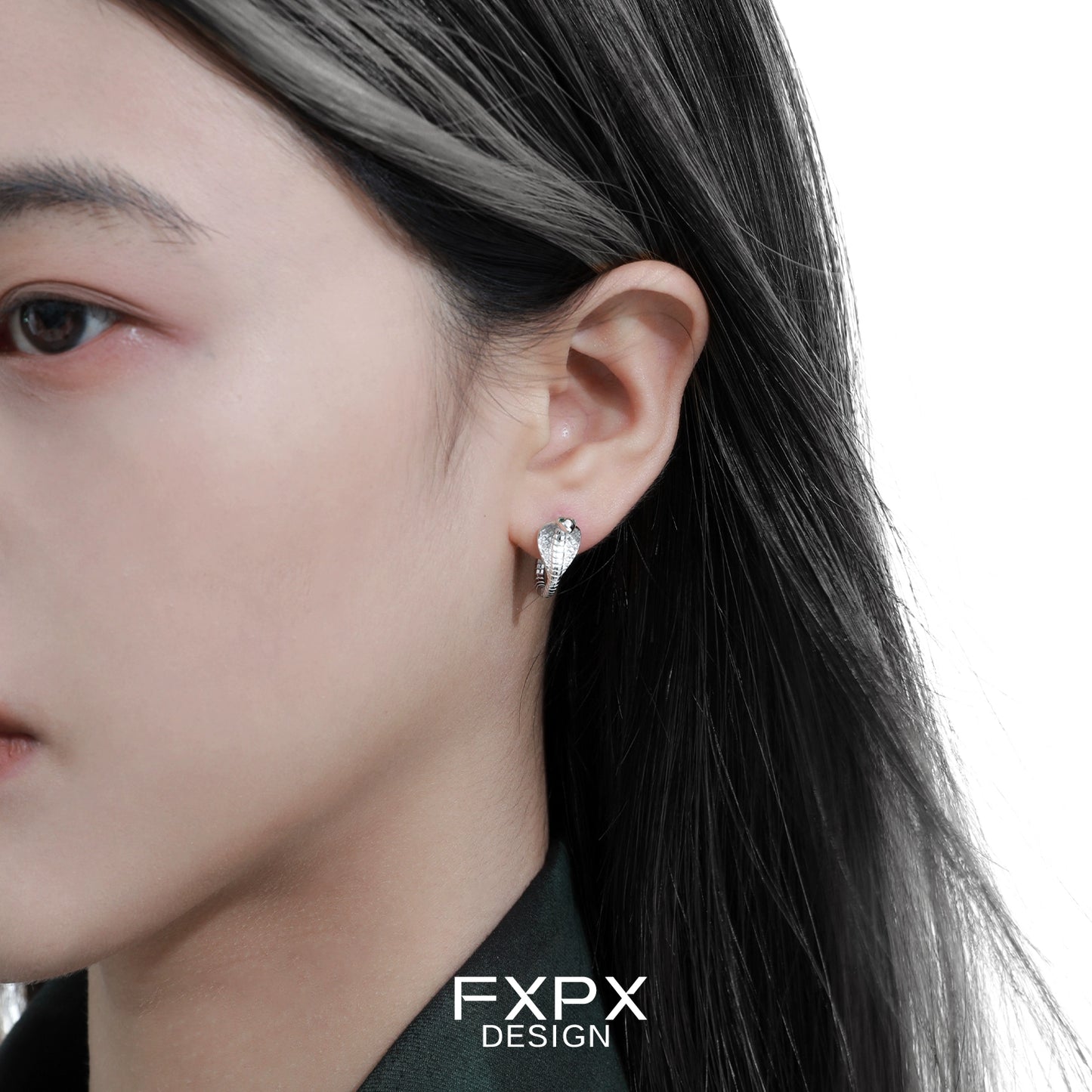 FXPX unique serpent earrings for women from Gothhalo Jewelry worn by a model with long dark hair