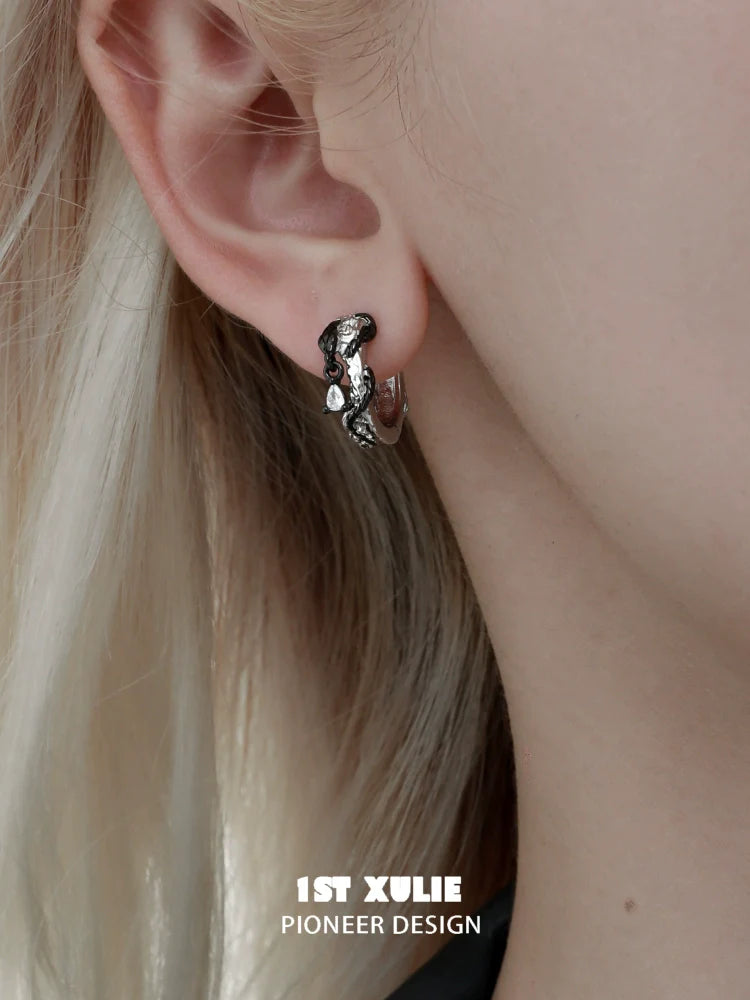 Gothic black rattlesnake earrings featuring intricate design for a bold fashion statement