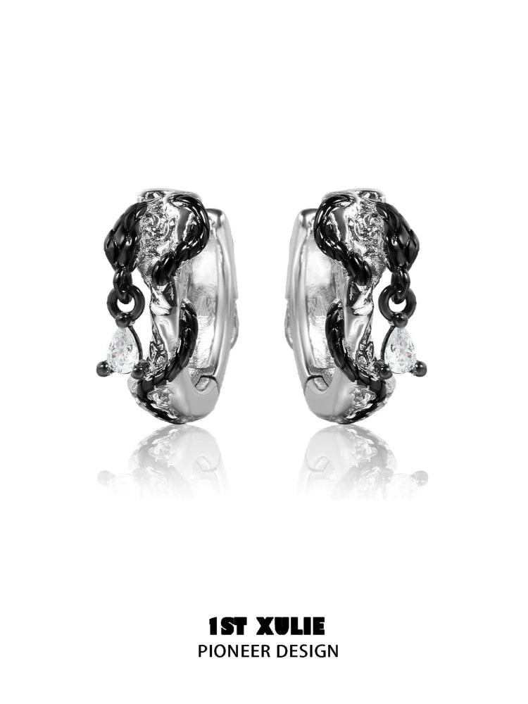Gothic black rattlesnake earrings with intricate design and sparkling accents from 1ST XULIE