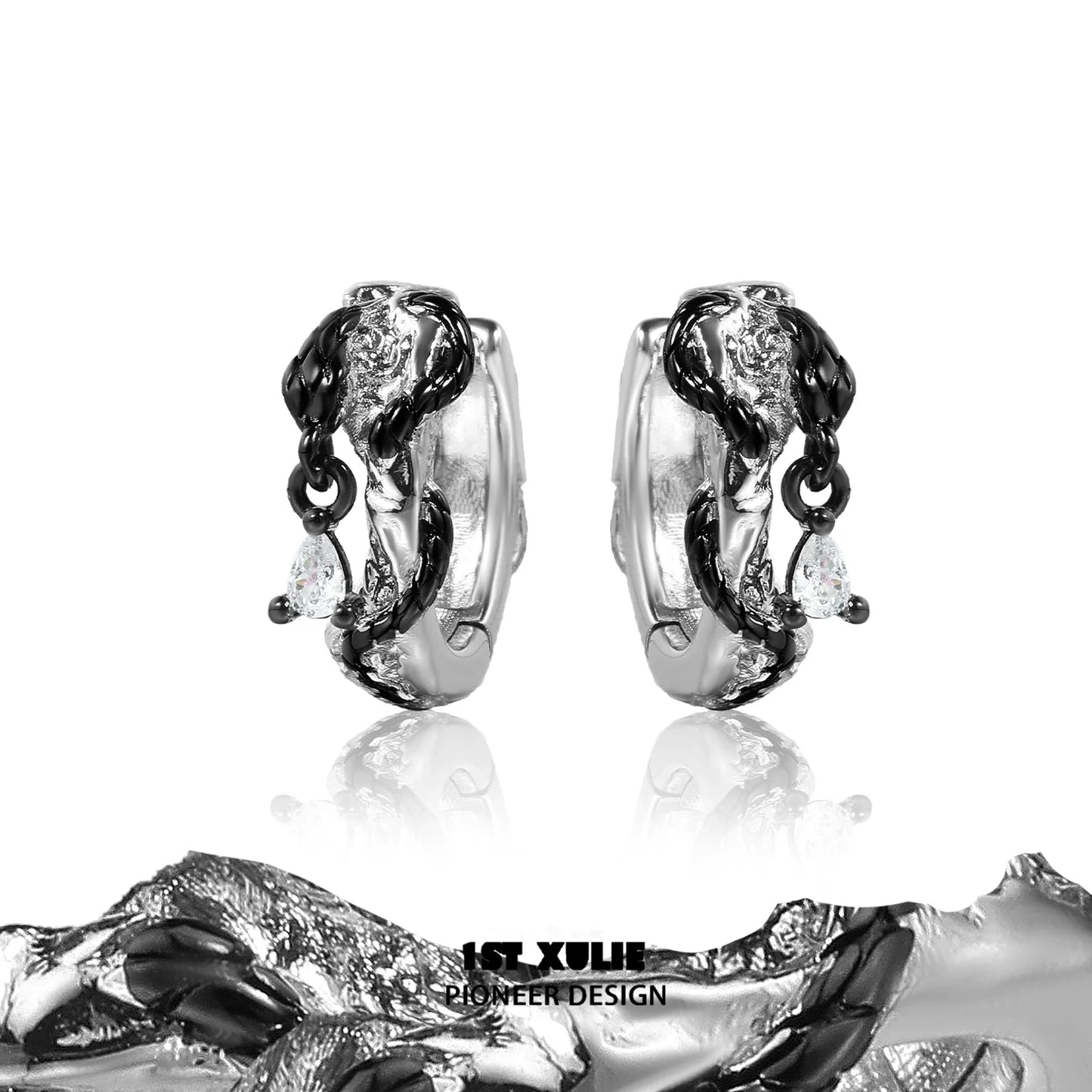 Gothic black rattlesnake earrings with intricate design and sparkling gemstones for unique fashion statement