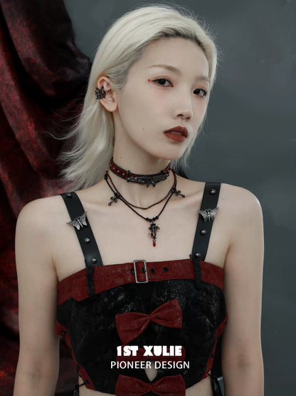 Gothic butterfly ear clip showcased on a model wearing a stylish gothic outfit
