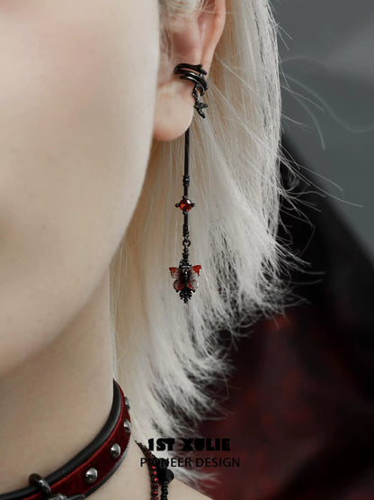 Gothic butterfly earrings featuring black and red designs with dangling elements for a unique style
