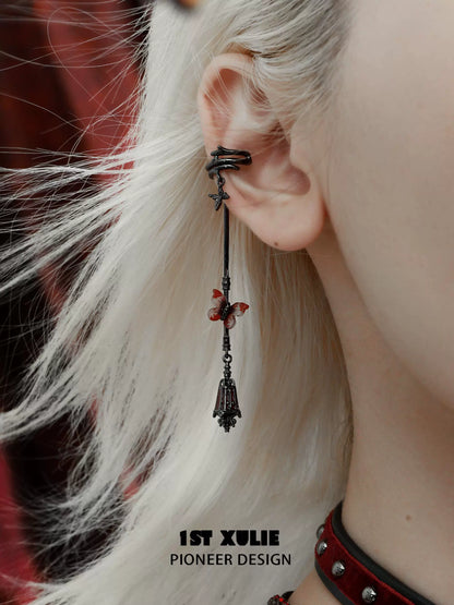 Gothic butterfly earrings with intricate design, perfect for adding a unique touch to any outfit