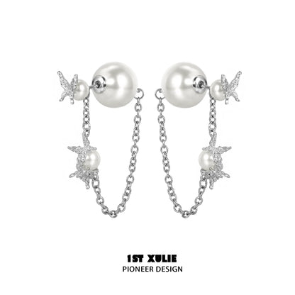 Elegant gothic butterfly earrings with silver chain and pearl accents for a stylish look