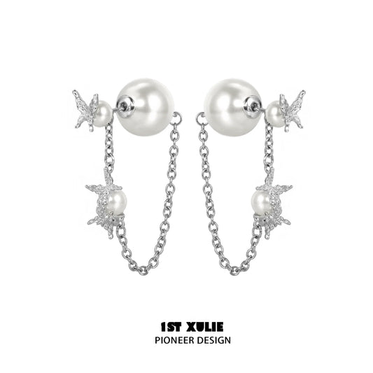 Elegant gothic butterfly earrings with silver chain and pearl accents for a stylish look