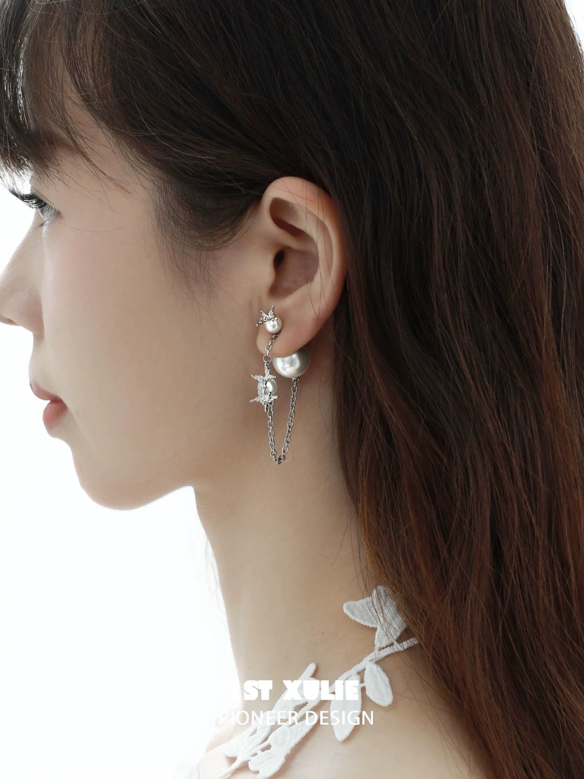 Unique gothic butterfly earrings with silver chains and star embellishments for an edgy style