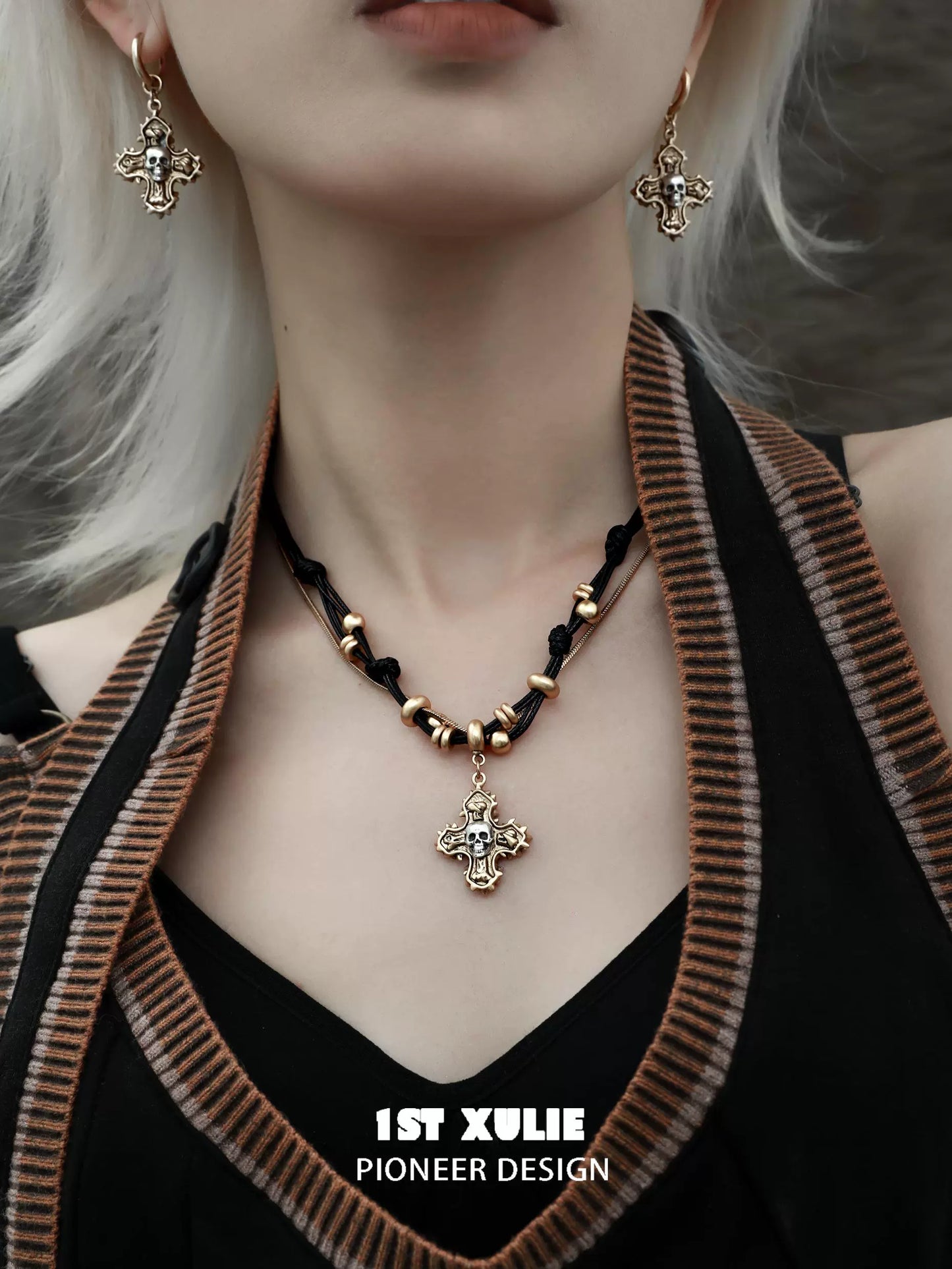 Gothic cross necklace from 1STXULIE with matching earrings and intricate design