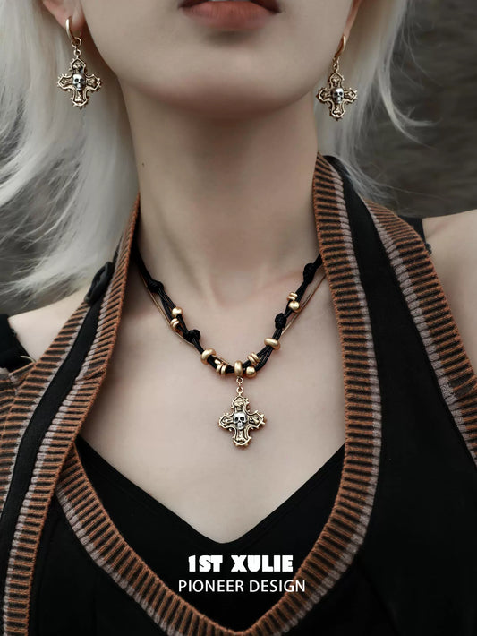 Gothic cross necklace from 1STXULIE with matching earrings and intricate design