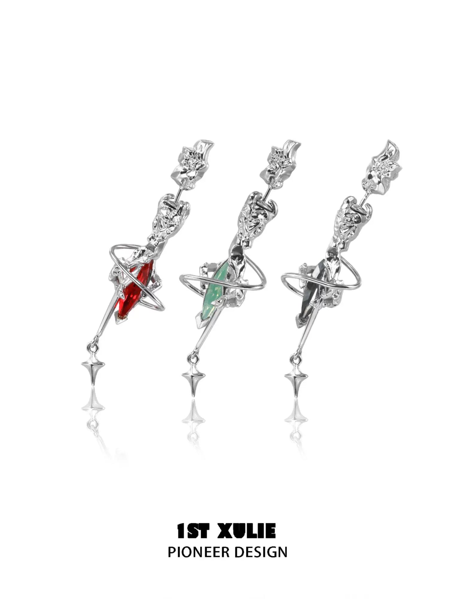 Unique gothic dream core earrings featuring red and green gemstones in ornate silver designs
