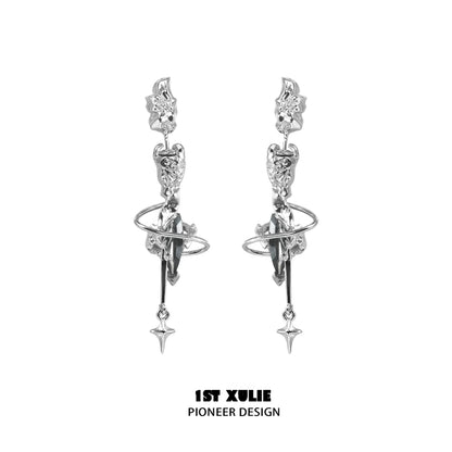 Gothic dream core earrings featuring intricate silver designs with dangling charms