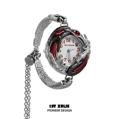 Gothic feather bracelet watch with silver detailing and red accents for unique style