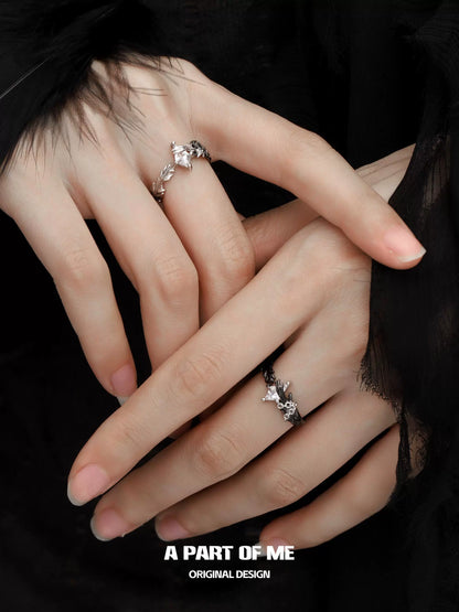 A PART OF ME gothic feather ring worn on fingers, showcasing its intricate design and craftsmanship