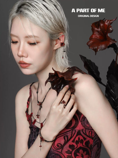 A model wearing a gothic mandala necklace featuring intricate designs and dark tones for a stylish look