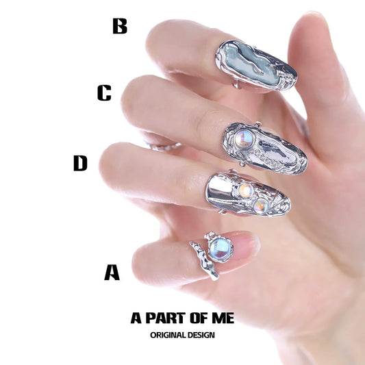 Gothic nail rings for women showcased on stylish hands with unique designs and shiny details