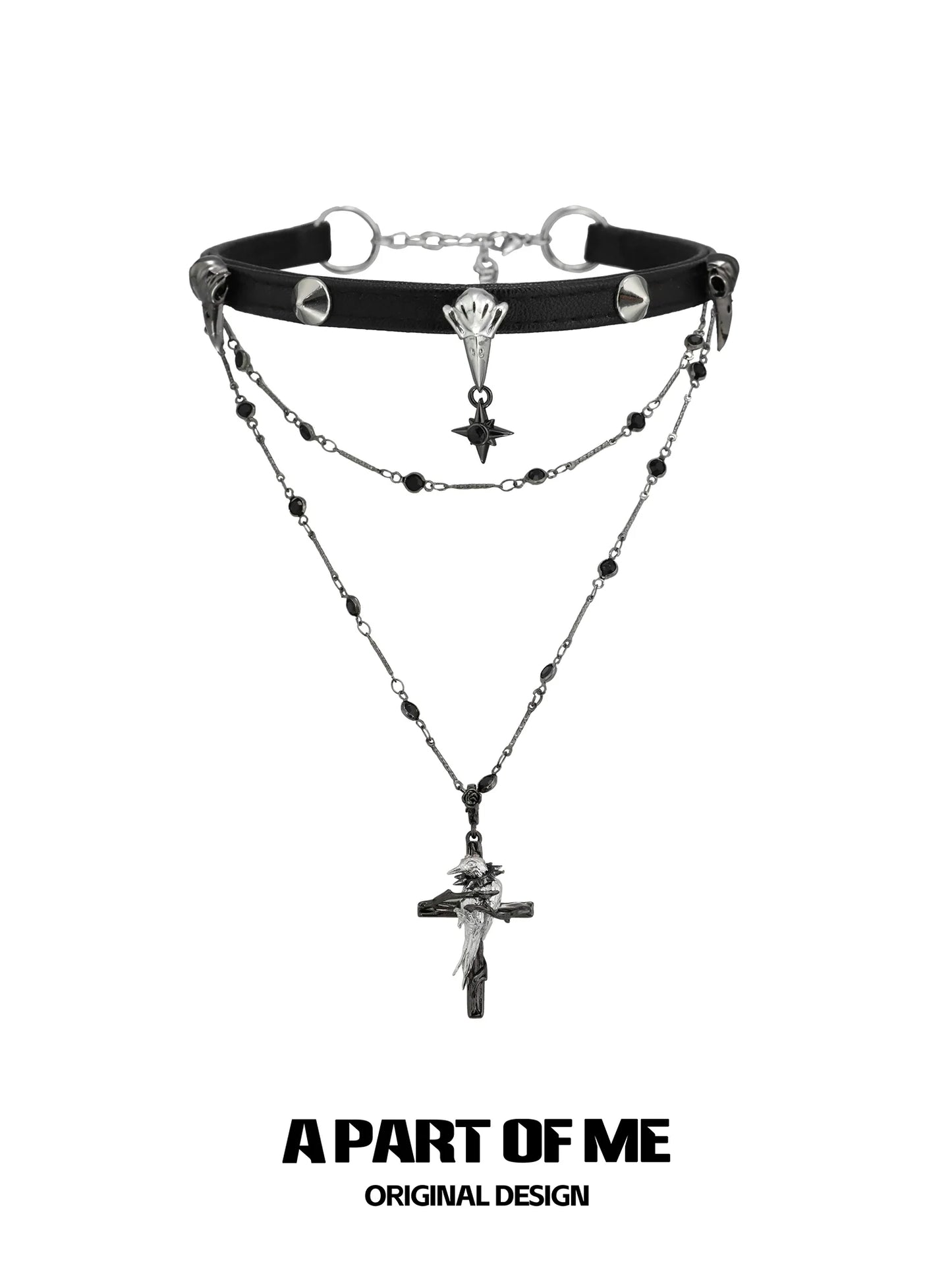 A PART OF ME gothic raven cross necklace featuring layered chains and detailed charms for a unique look