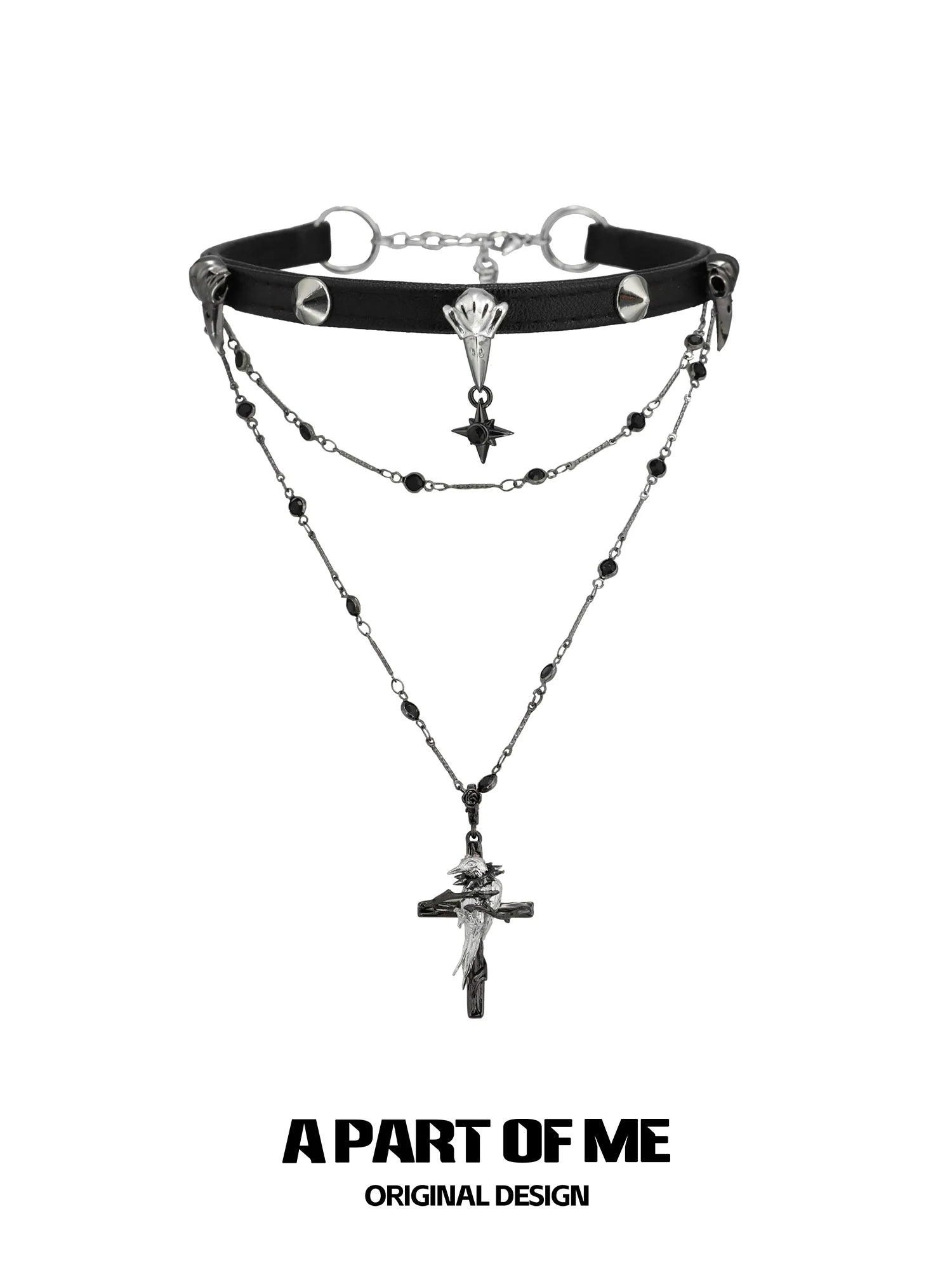 A PART OF ME gothic raven cross necklace featuring layered chains and detailed charms for a unique look