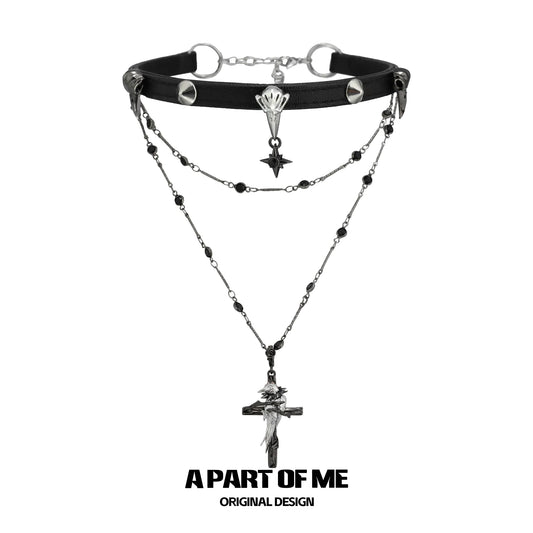 Gothic raven cross necklace with layered chains and black accents for a dark, stylish look