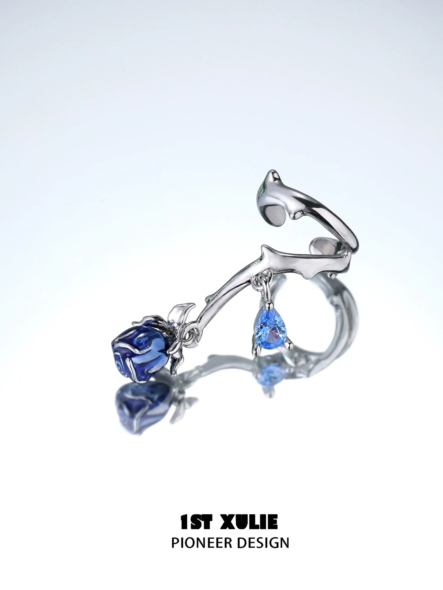 Gothic rose ear cuffs in silver with a blue rose accent for stylish and unique ear jewelry