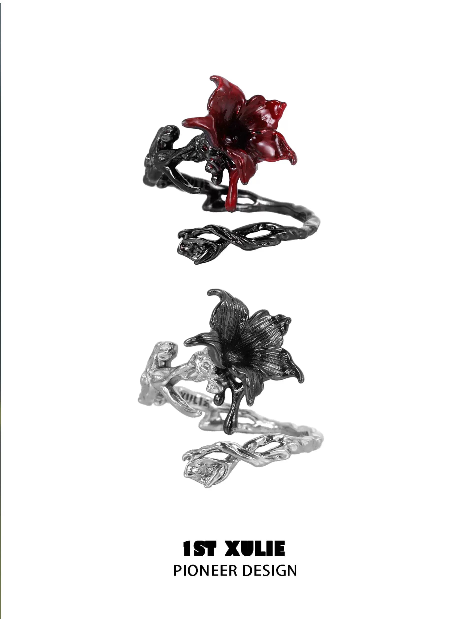 Gothic silver mandala ring featuring intricate floral design and red accents from 1STXULIE