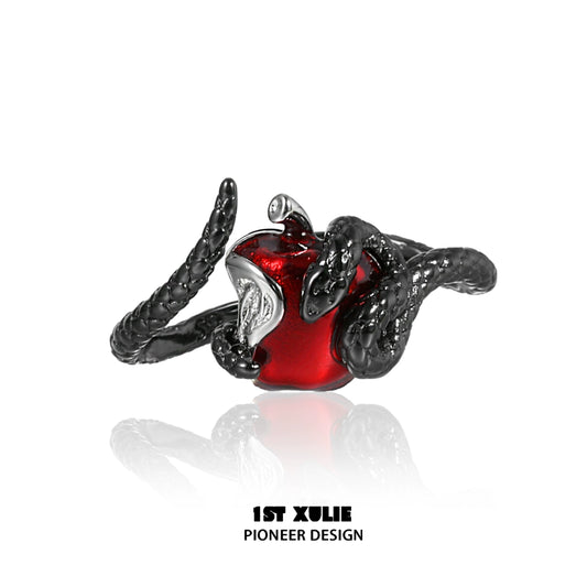 Gothic snake apple ring featuring entwined black snakes and a glossy red apple design