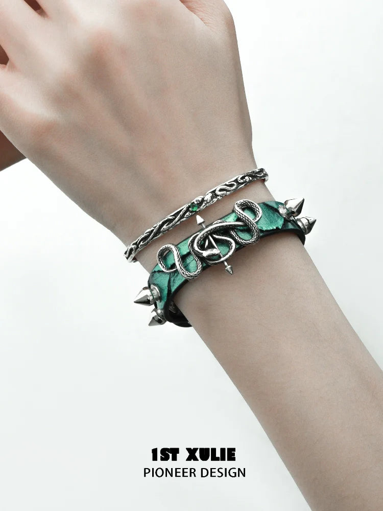 1ST XULIE gothic snake bracelet crafted with intricate details and spikes for a bold look.
