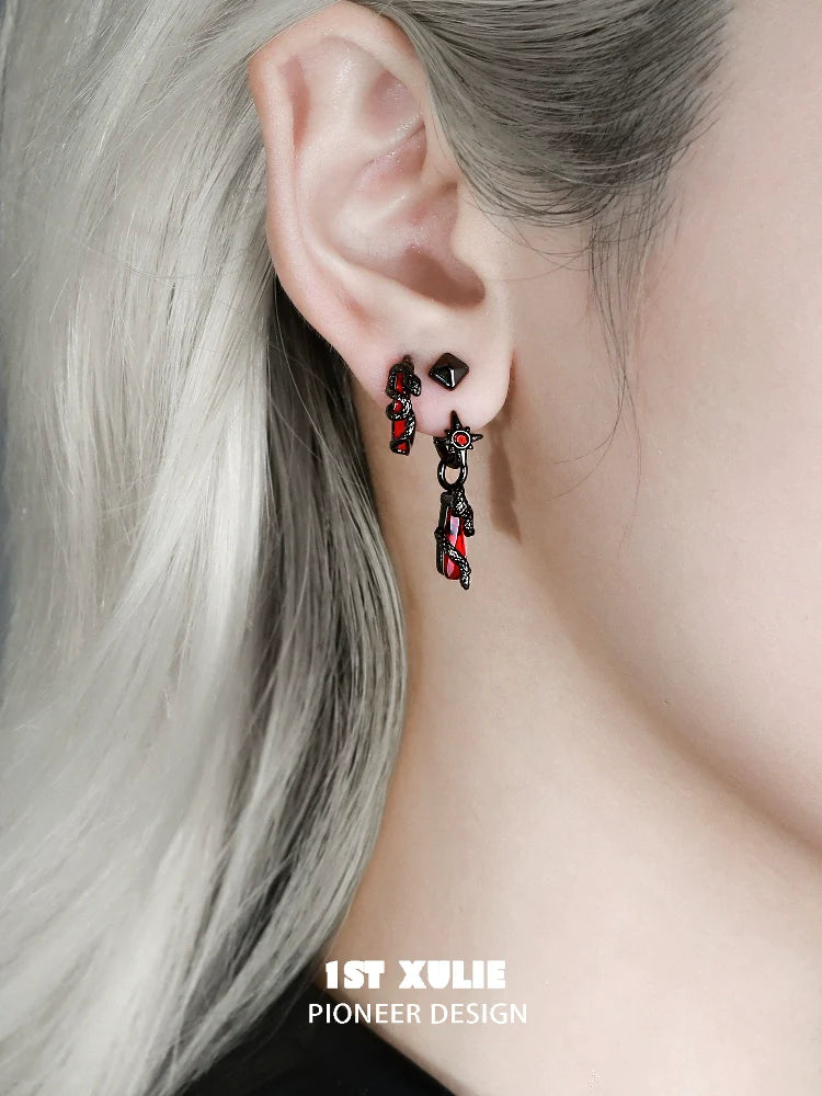 Unique gothic snake earrings with red and black design, perfect for a bold fashion statement
