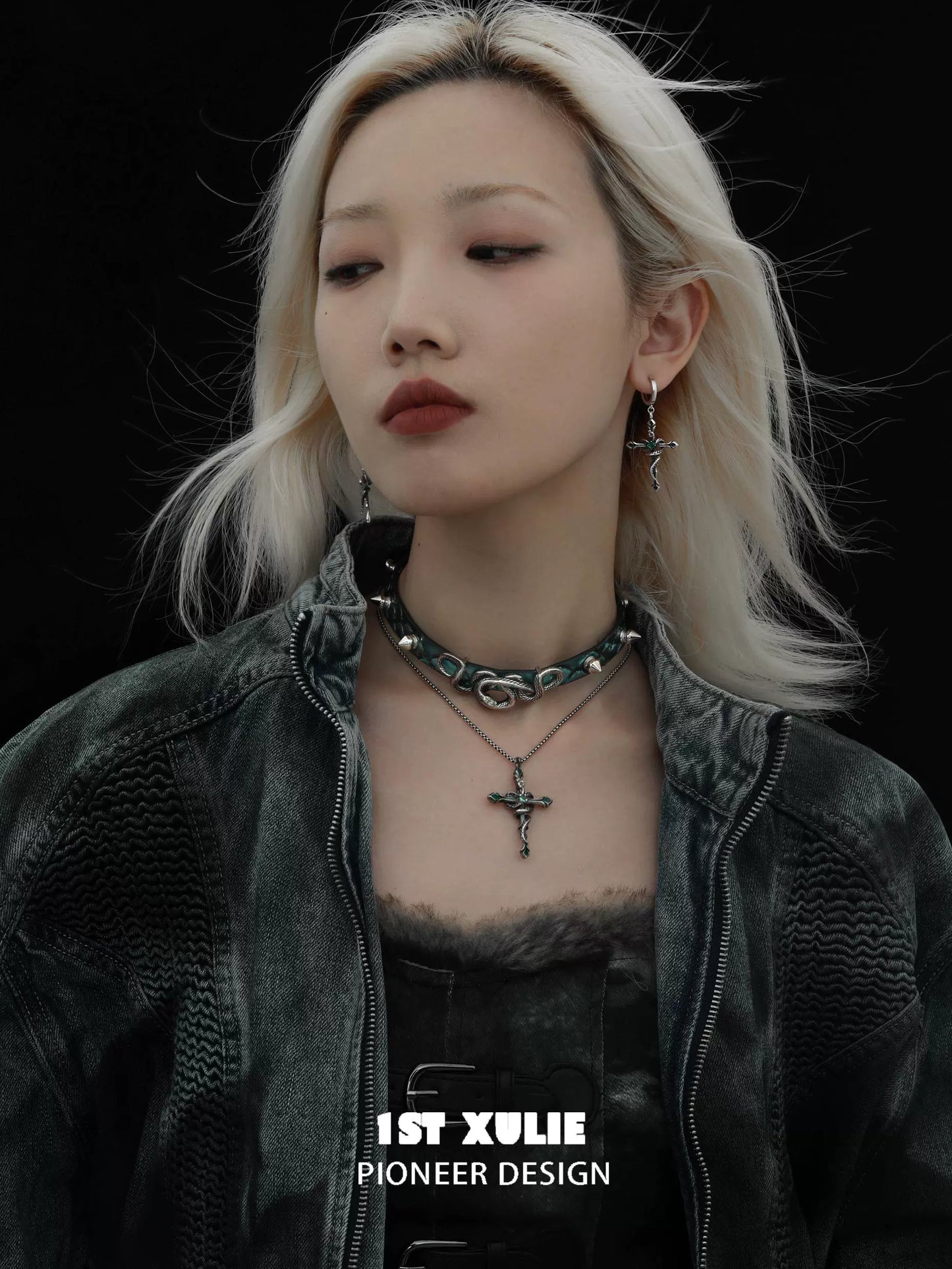 Gothic snake necklace featured on a model wearing edgy fashion with dark makeup
