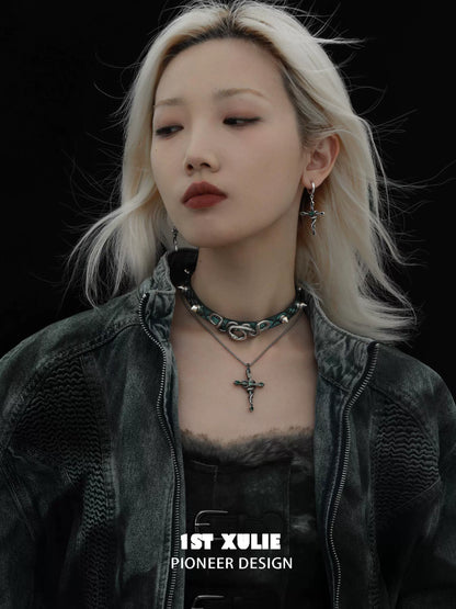 Gothic snake necklace featured on a model wearing edgy fashion with dark makeup