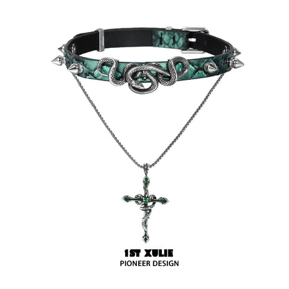 Gothic snake necklace with a silver cross pendant hanging from a spiked black choker