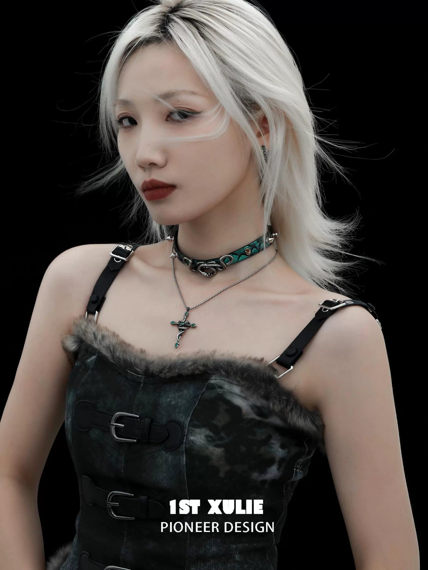 Model wearing a gothic snake necklace with a fashion-forward outfit for a bold style statement