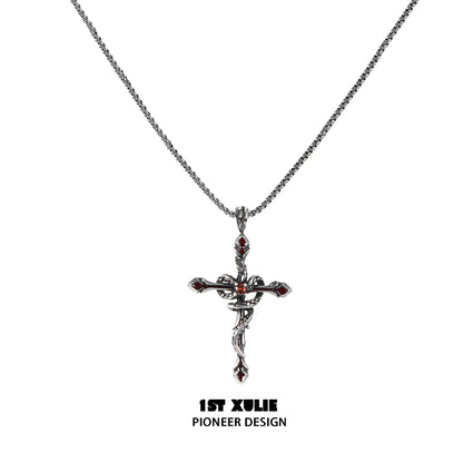 Gothic snake necklace with a detailed silver cross pendant and intricate design by 1STXULIE