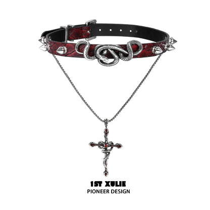 Gothic snake necklace with cross pendant featuring intricate detailing and a unique design