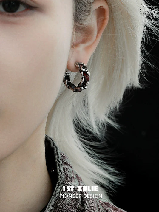 Gothic venomous spirit earrings featuring a unique twisted snake design for a bold statement