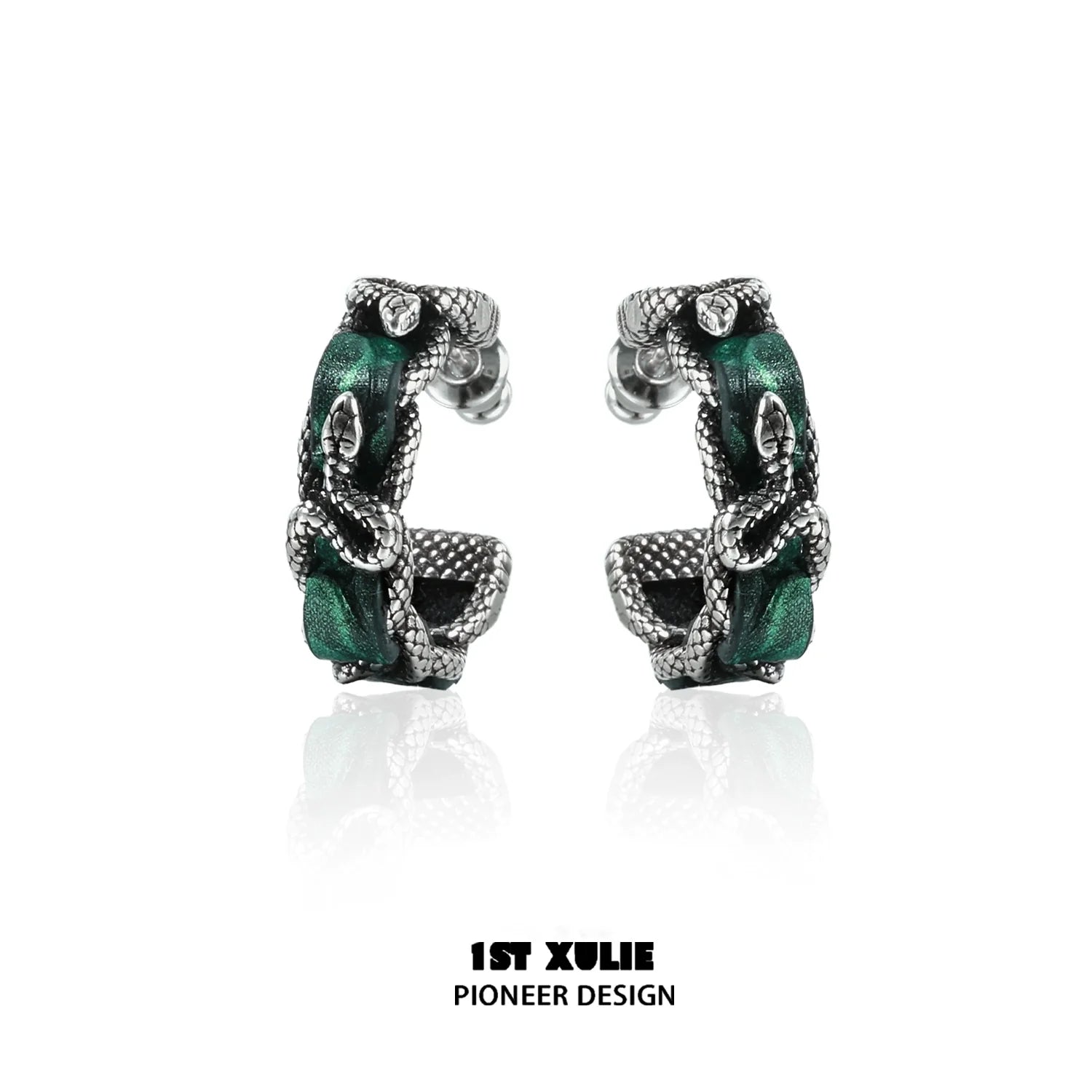 Gothic venomous spirit earrings featuring intricate design with silver tones and green accents for a bold look