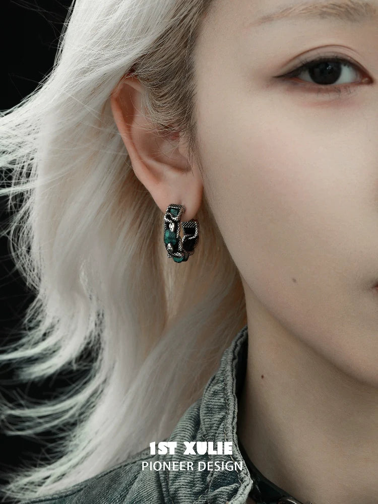 Stylish Gothic Venomous Spirit Earrings displayed on a model showcasing their unique design