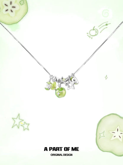 A silver chain necklace featuring a green apple star necklace design with colorful charms