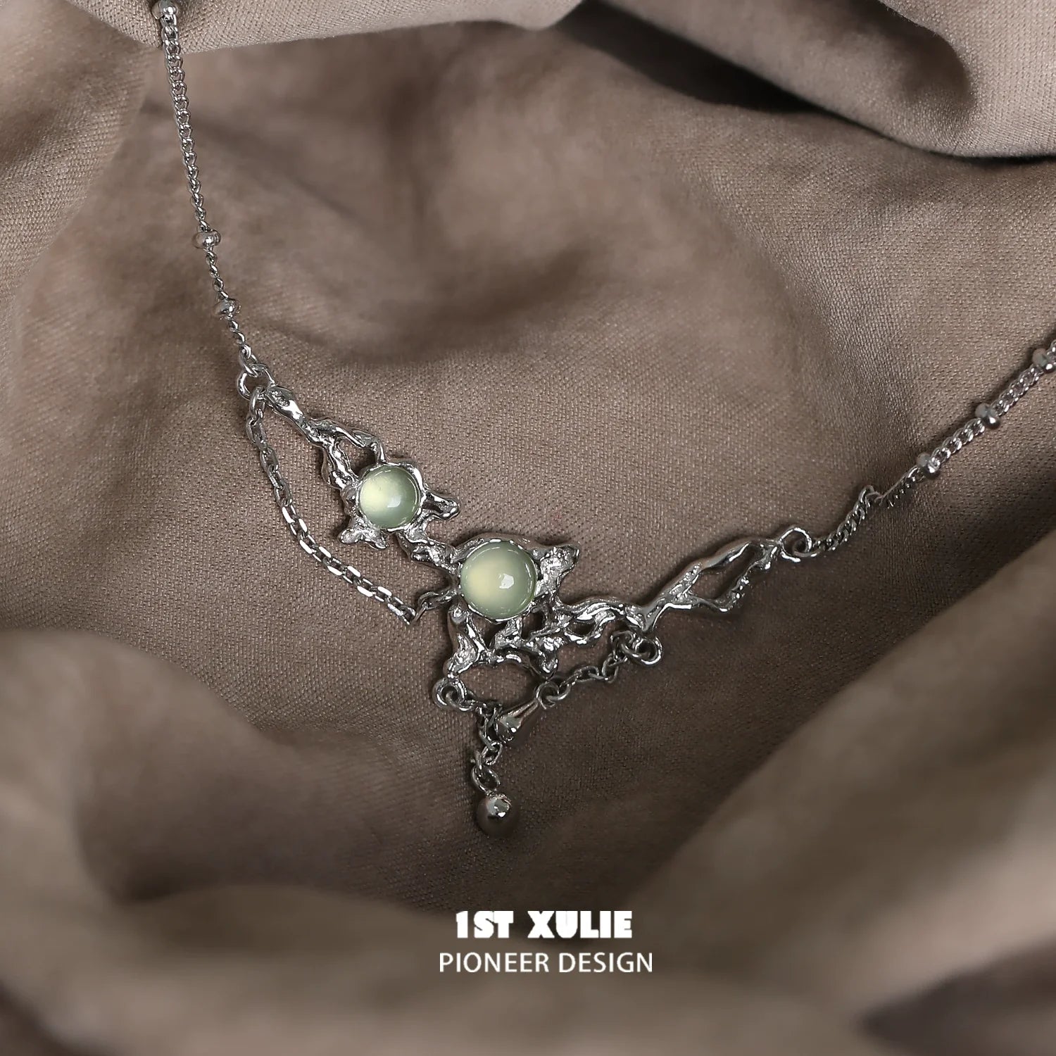 Unique 1STXULIE green gem silver necklace featuring elegant design and shimmering gems