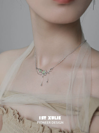 Elegant green gem silver necklace featuring sparkling accents for a chic look