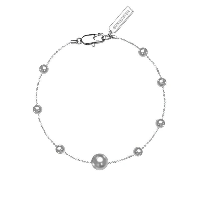 SUN HUNTER gypsy star pearl bracelet featuring a delicate design with lustrous pearls