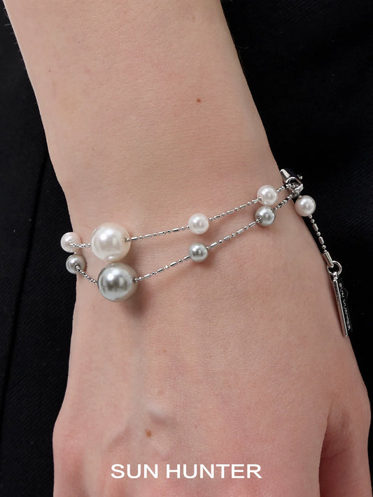 SUN HUNTER gypsy star pearl bracelet with silver chain and various sized pearls