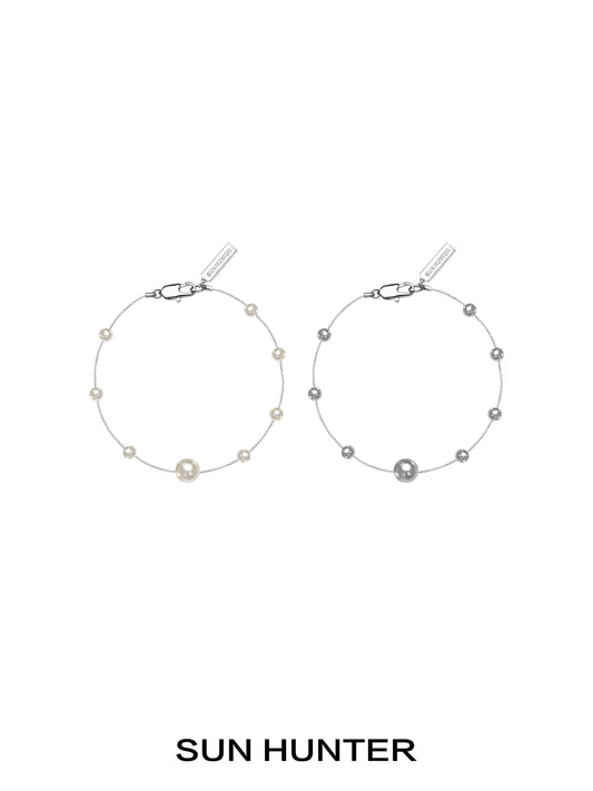 SUN HUNTER gypsy star pearl bracelet in silver and gold with decorative pearl accents