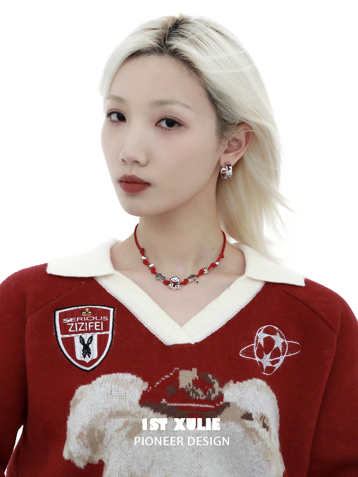 Model wearing a happy puppy braided necklace with colorful beads and charms for a trendy look