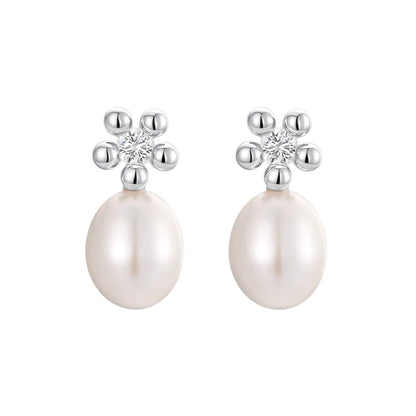 Elegant island flower pearl earrings with silver accents and sparkling details for a stylish look
